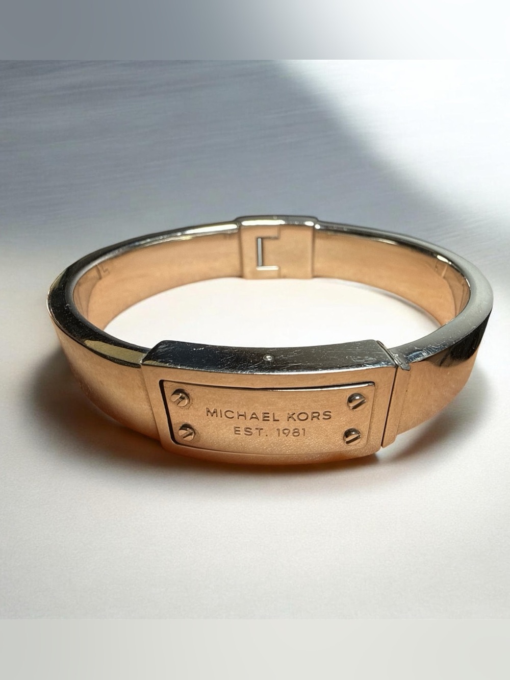 Michael Kors Silver-Tone Logo Plaque Hinge Bangle Bracelet Est. 1981 Rivet